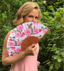 Liz Earle holding Khu Khu Cool Camellias hand-fan Summer 2019