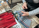 Inside the production of the Lulu Guinness x Khu Khu lip hand-fan