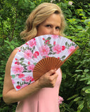 Liz Earle holding Khu Khu Cool Camellias Hand-Fan