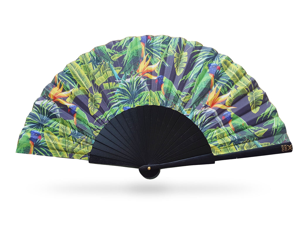 Khu Khu tropical Green Parakeet hand-fan. Beautiful green birds perch amongst tropical leaves and orange passion flowers. Fan mounted with black painted wood sticks and mounted with high grade cotton. 